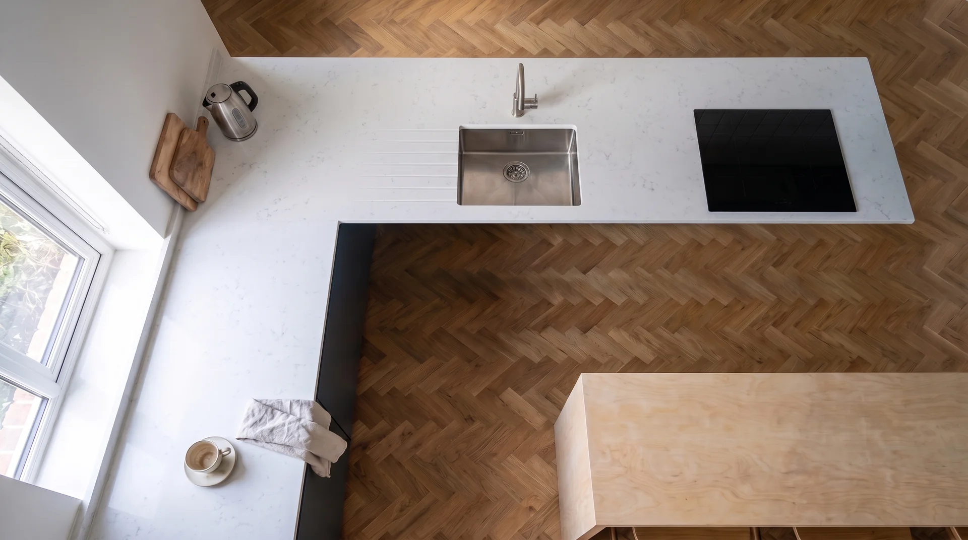 Ice Snow quartz worktop shown from an overhead kitchen view