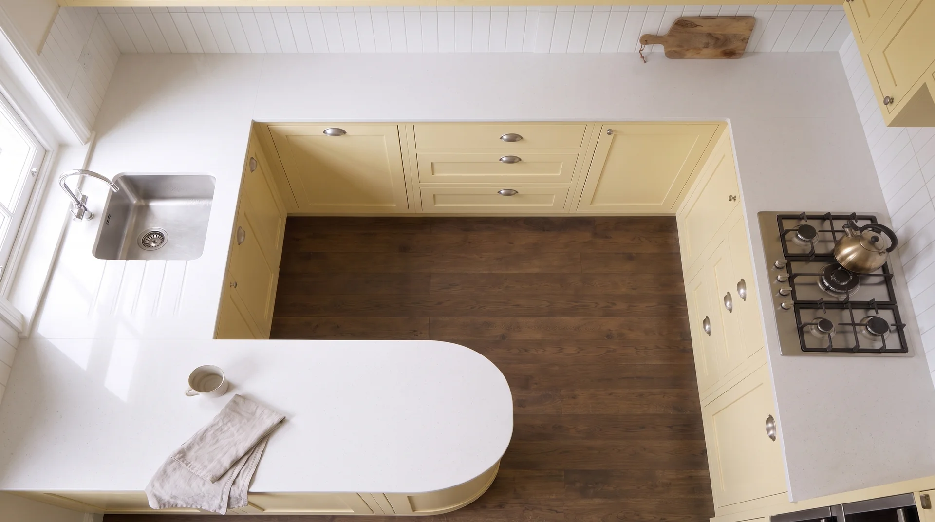 Ice Branco quartz worktop shown from an overhead kitchen view