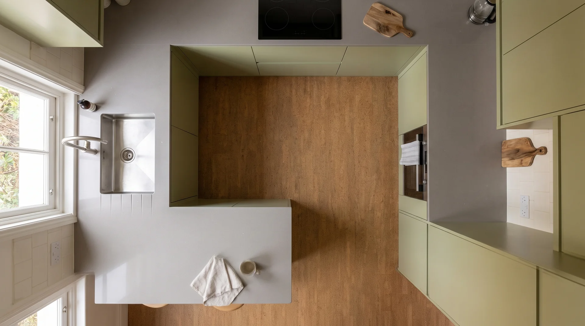 Ice Gris quartz worktop shown from an overhead kitchen view