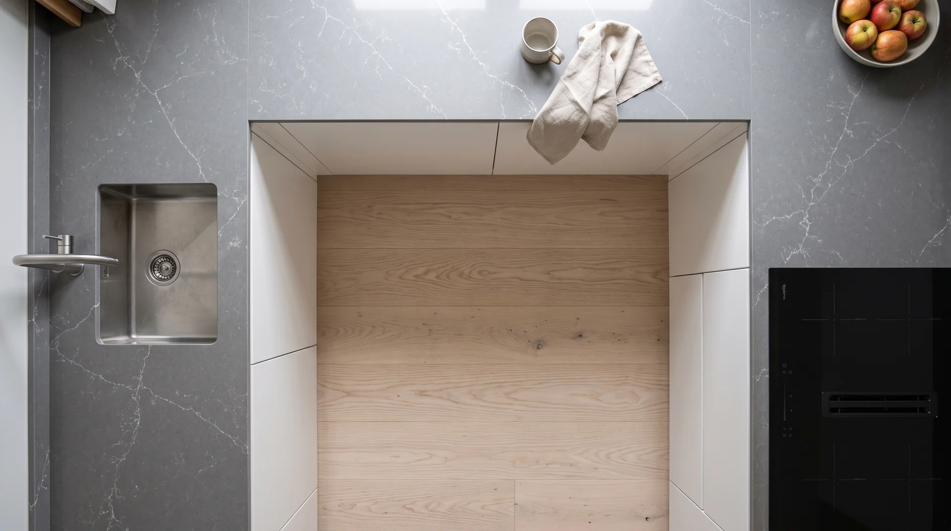 Carrara Silver quartz worktop shown from an overhead kitchen view