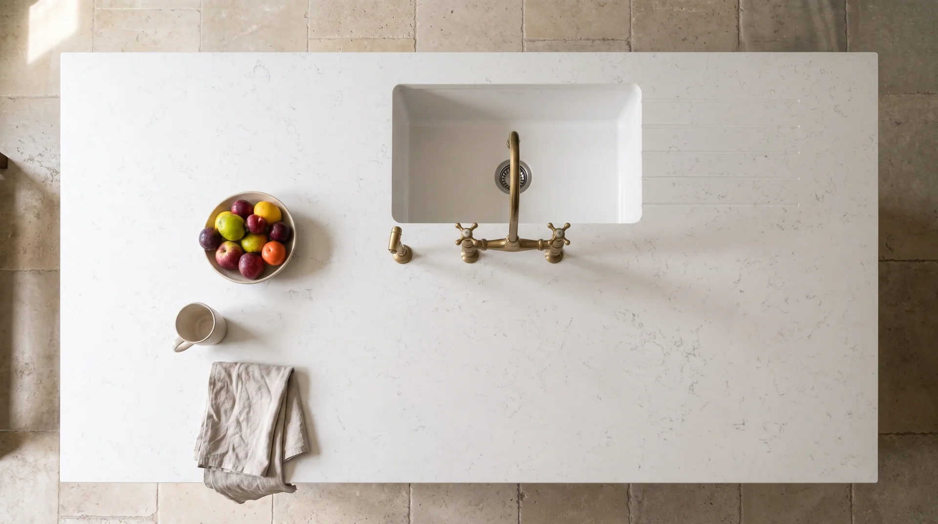 Carrara Oro quartz worktop shown from an overhead kitchen view