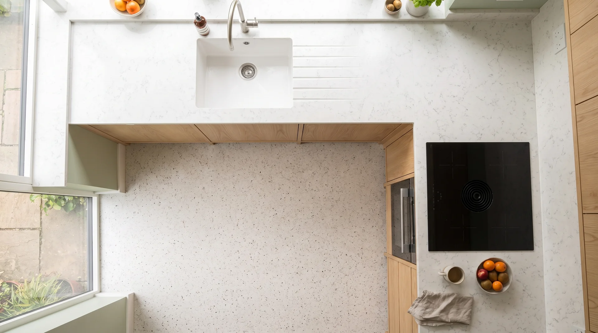 Carrara Massa quartz worktop shown from an overhead kitchen view