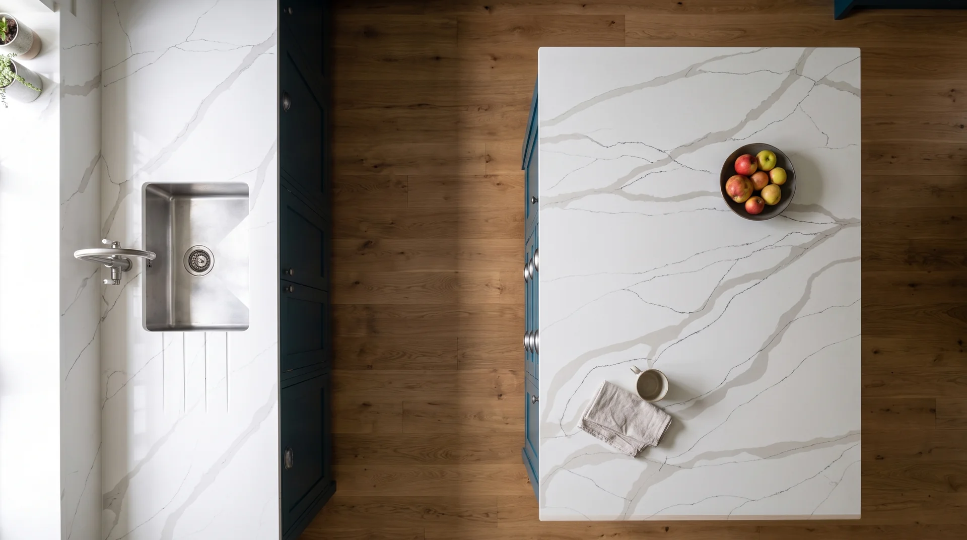 Statuario Oro quartz worktop shown from an overhead kitchen view