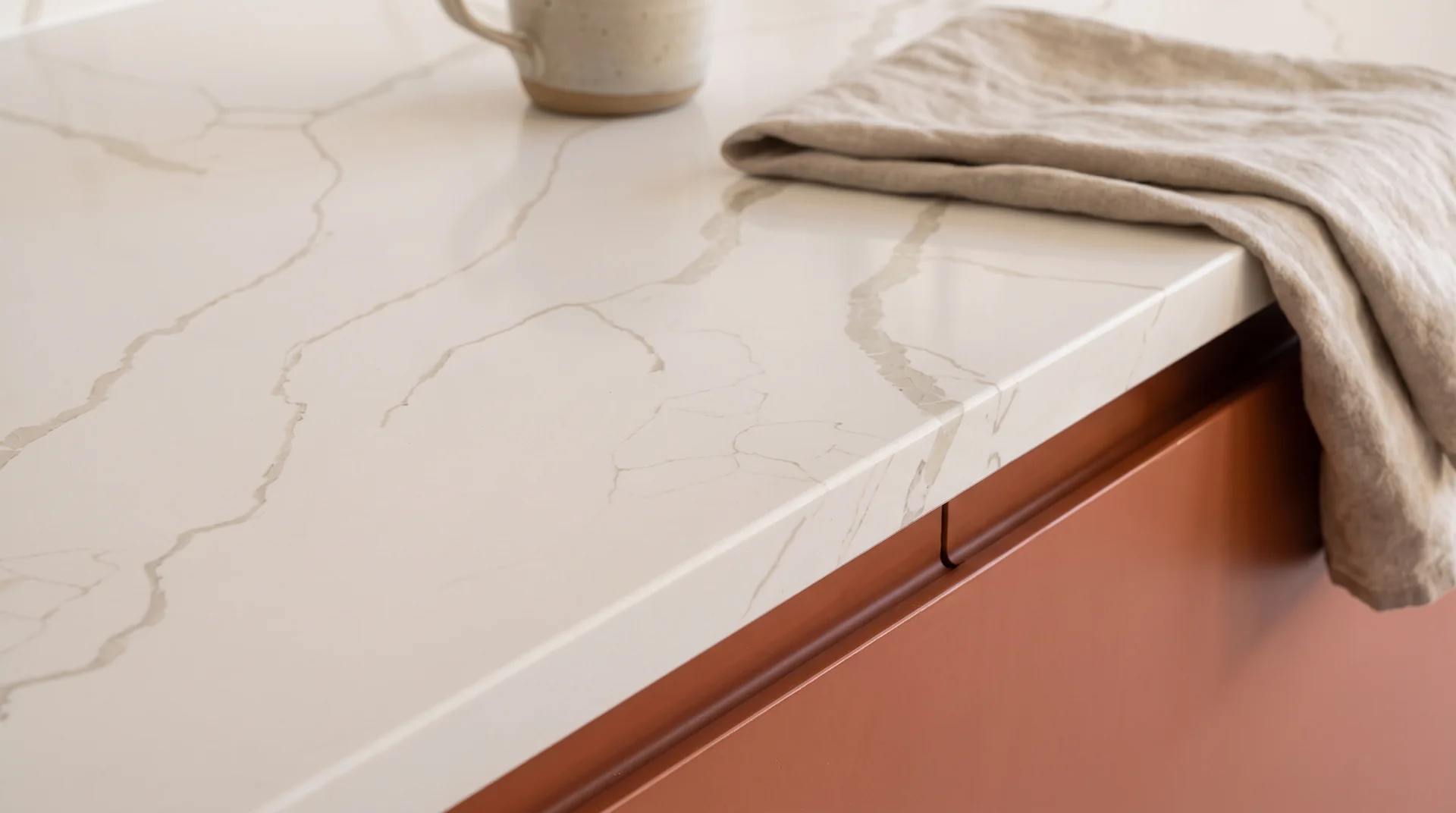 Calacatta Protofinio quartz worktop close-up showing surface detail