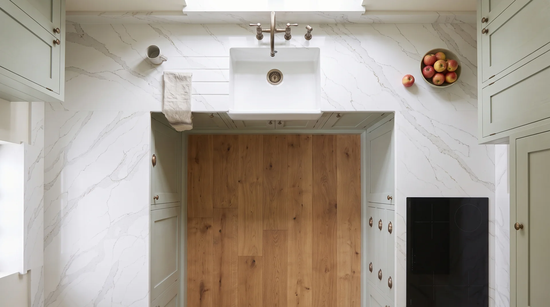 Calacatta Gold quartz worktop shown from an overhead kitchen view