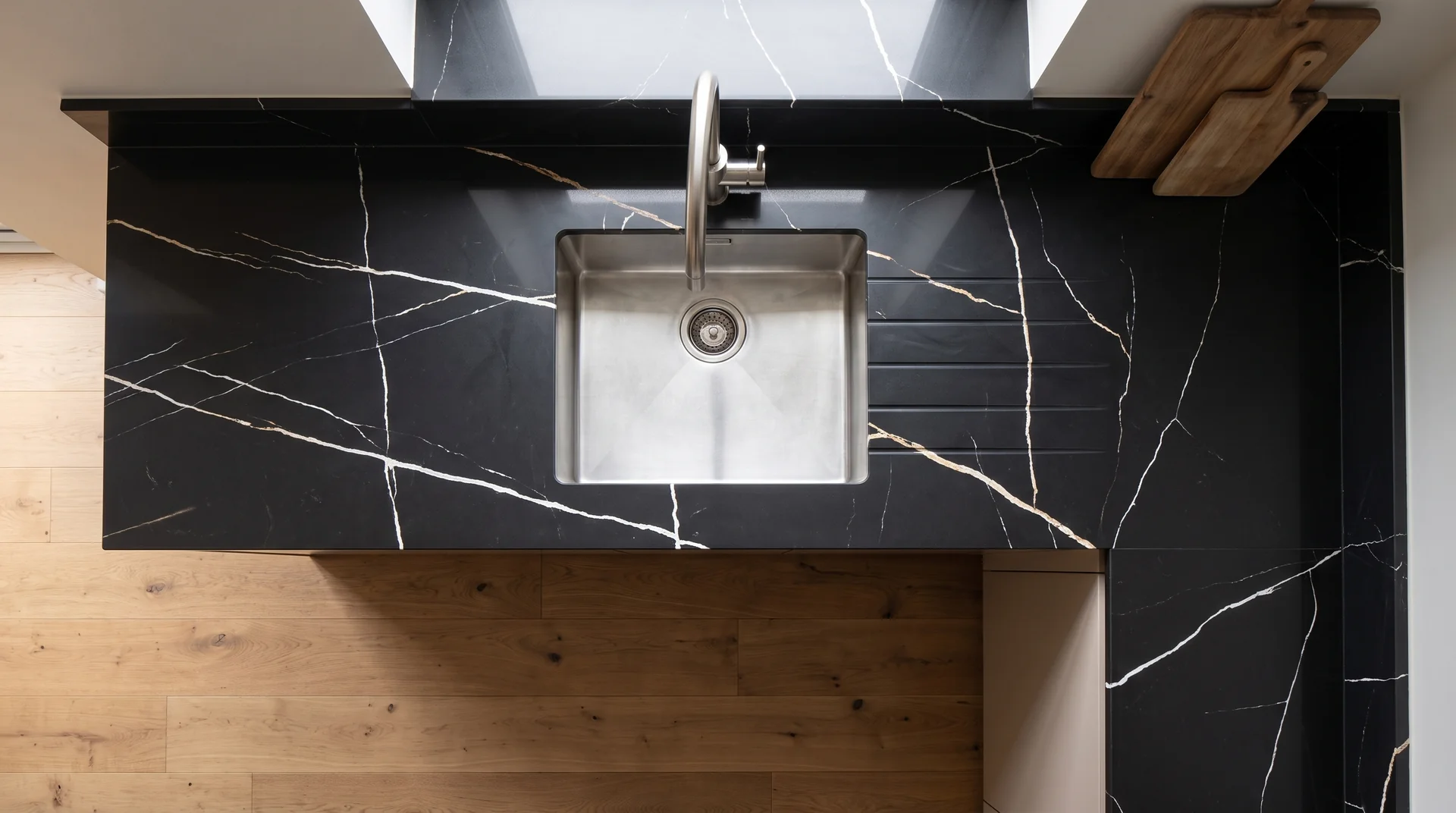 Sahara Noir quartz worktop shown from an overhead kitchen view