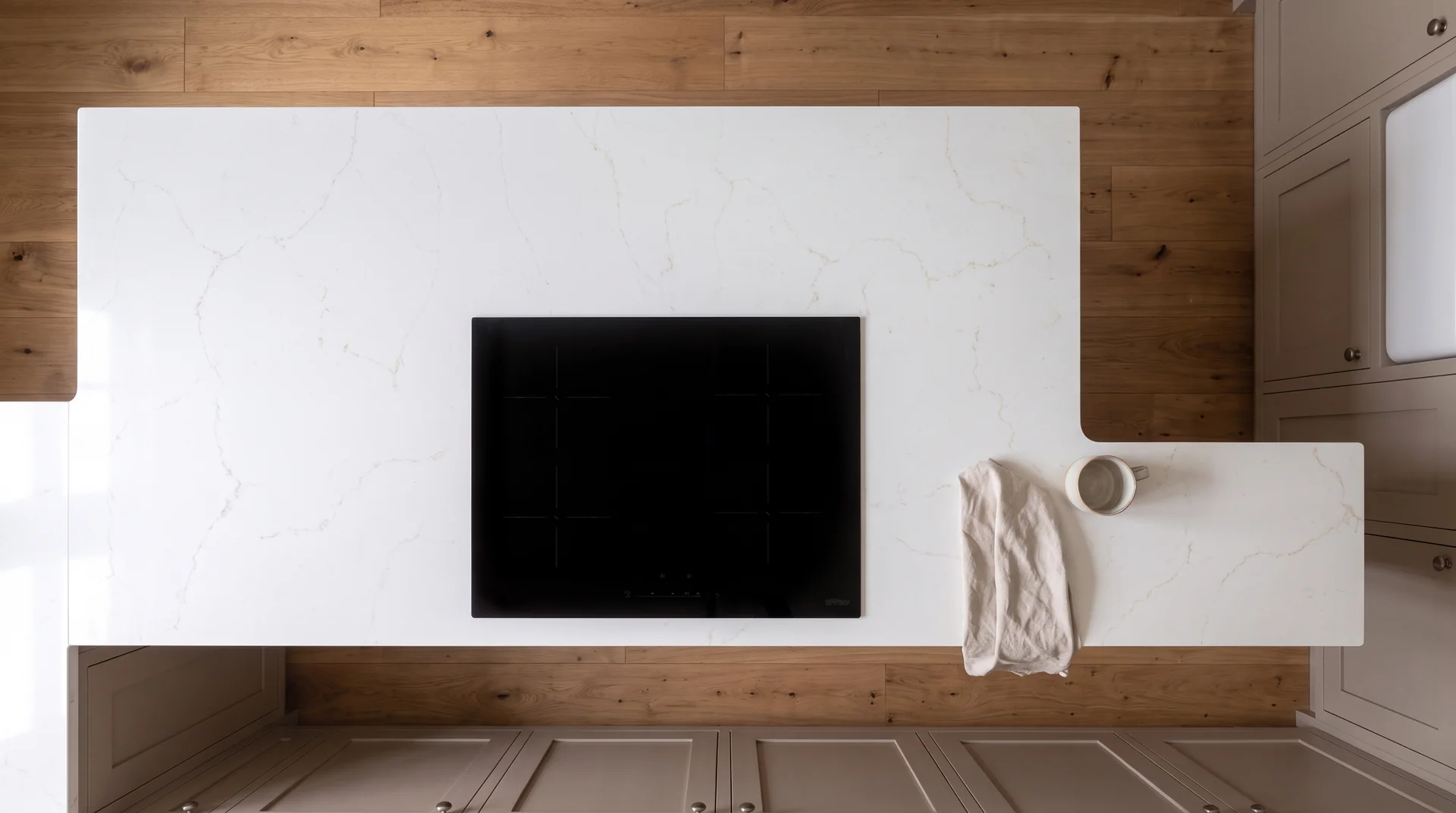 Misterio Onyx Gold quartz worktop shown from an overhead kitchen view