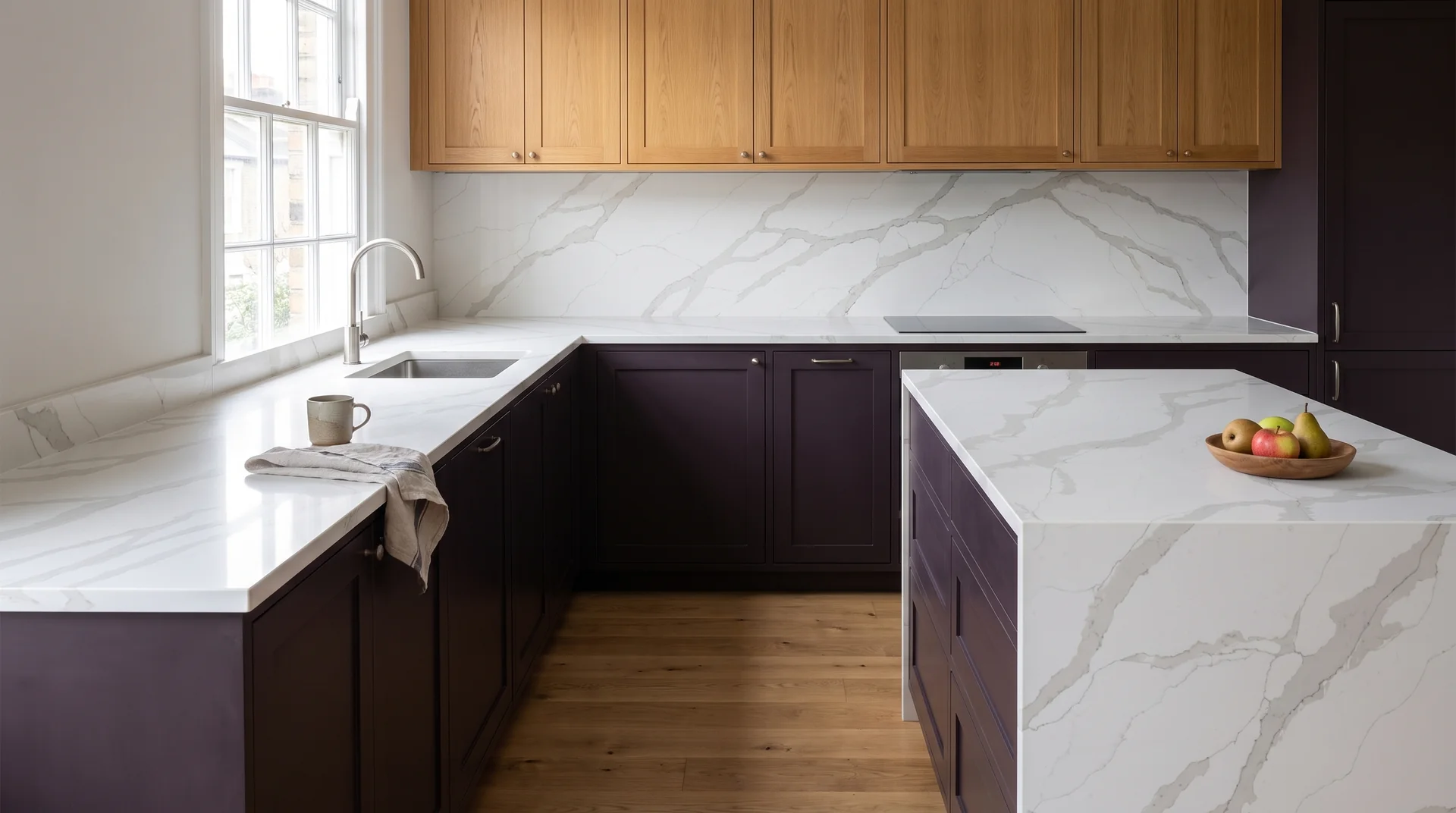 Calacatta Gold Extra Modern Quartz Stone worktop in a wide kitchen view