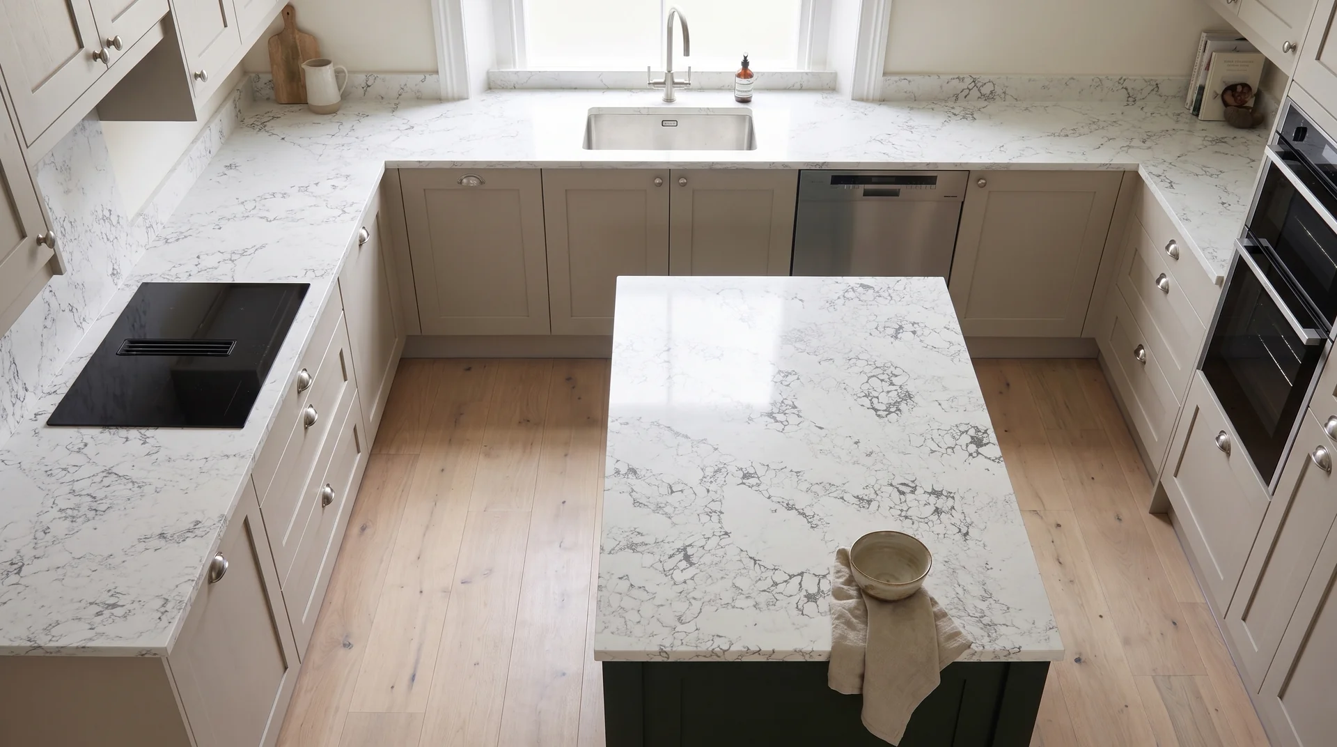 Arabescato quartz worktop shown from an overhead kitchen view