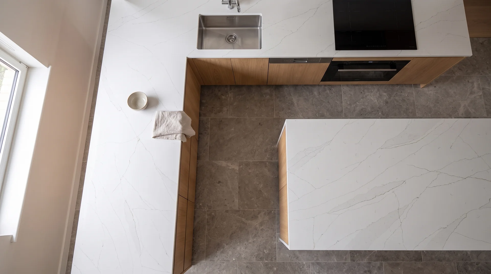 Calacatta Royal quartz worktop shown from an overhead kitchen view
