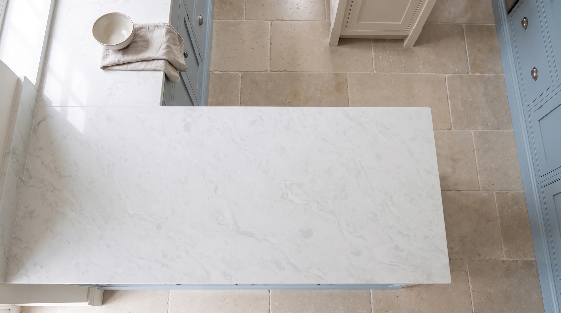 Fusion White quartz worktop shown from an overhead kitchen view