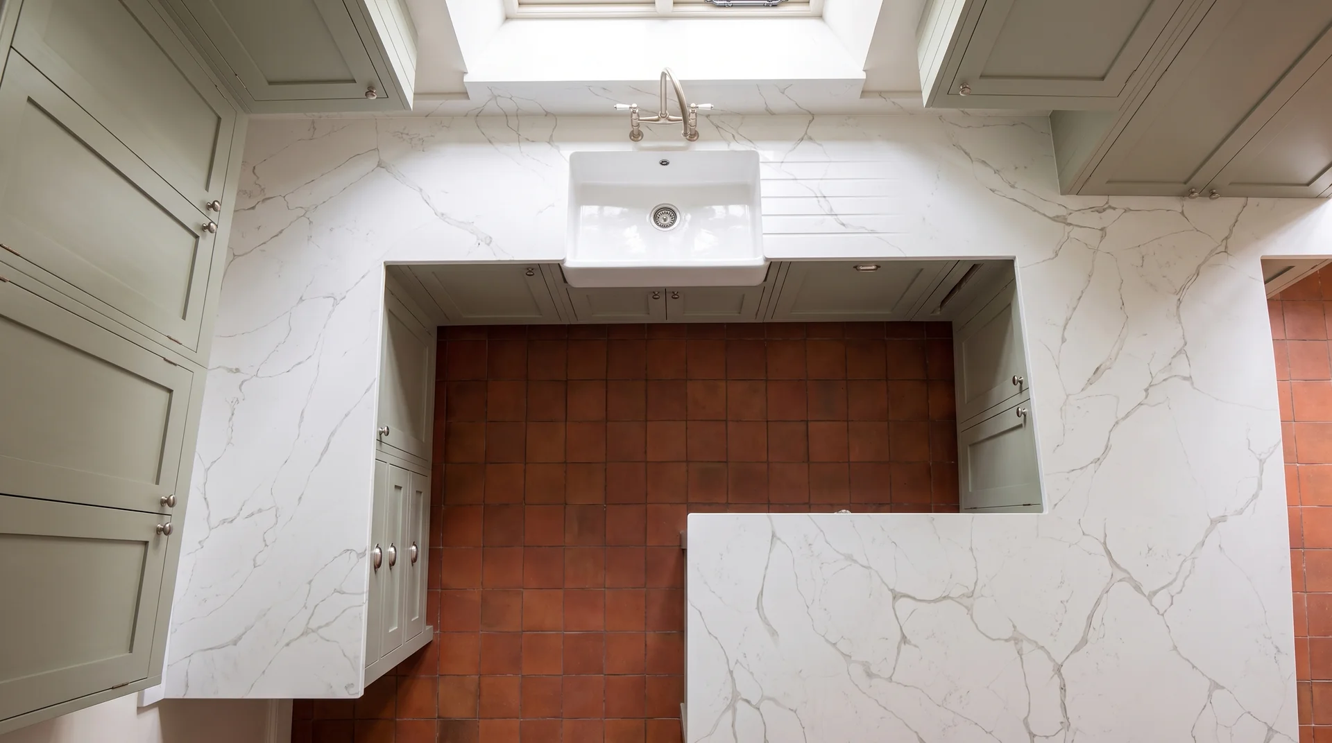 Emerald Gold quartz worktop shown from an overhead kitchen view
