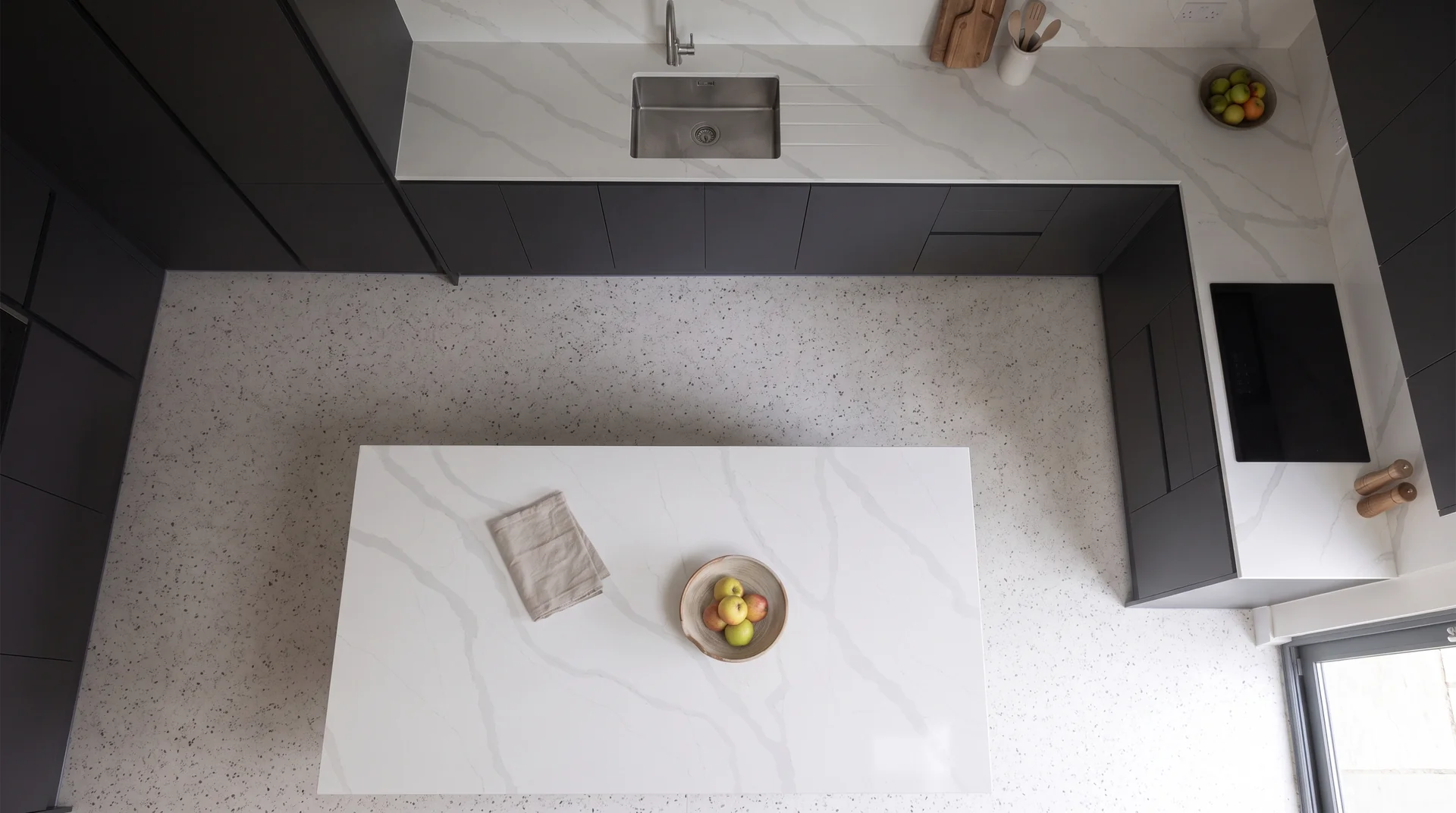 Calacatta Platinum quartz worktop shown from an overhead kitchen view