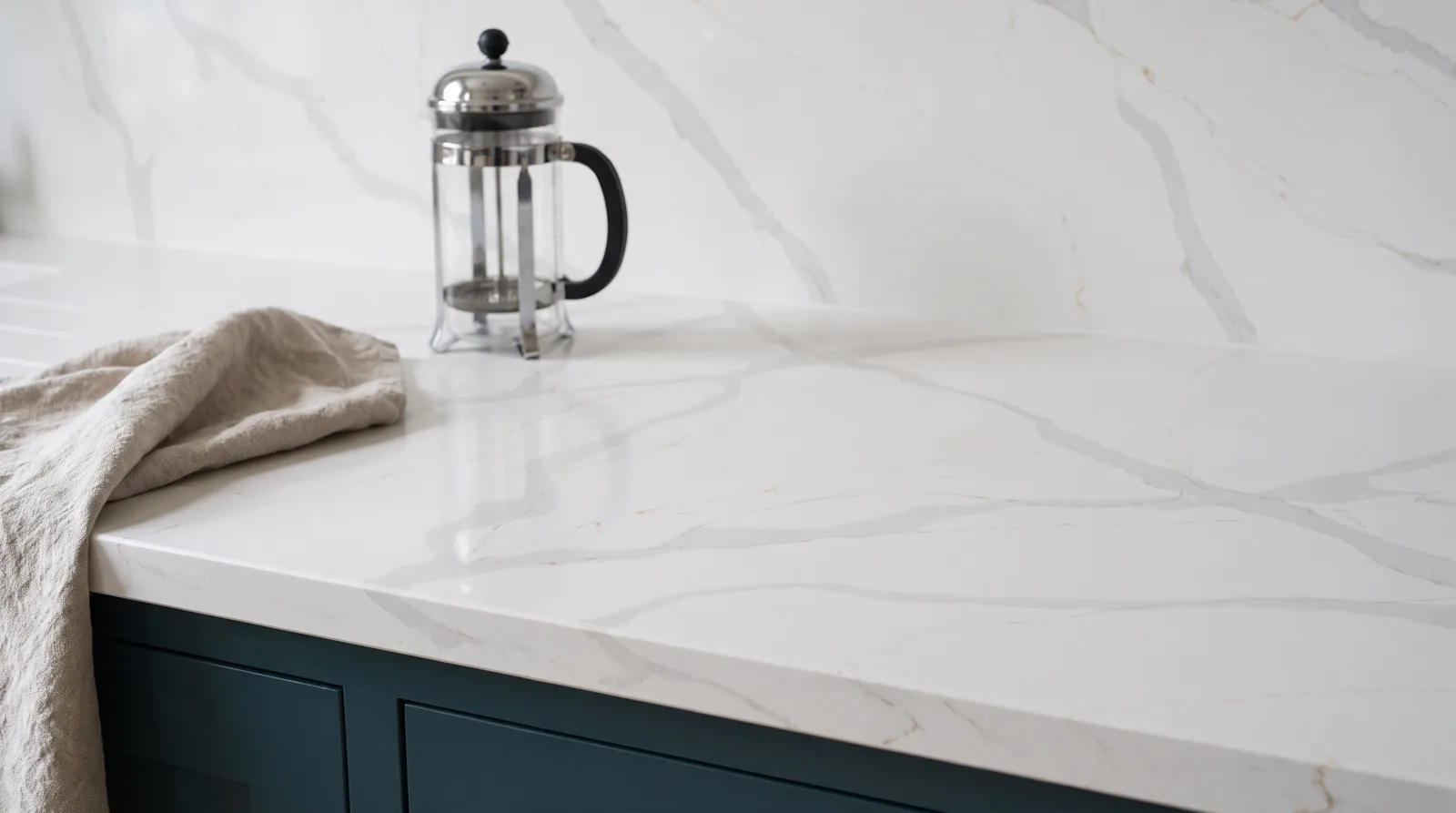 Lugano Gold NobleStone worktop in a close kitchen detail view