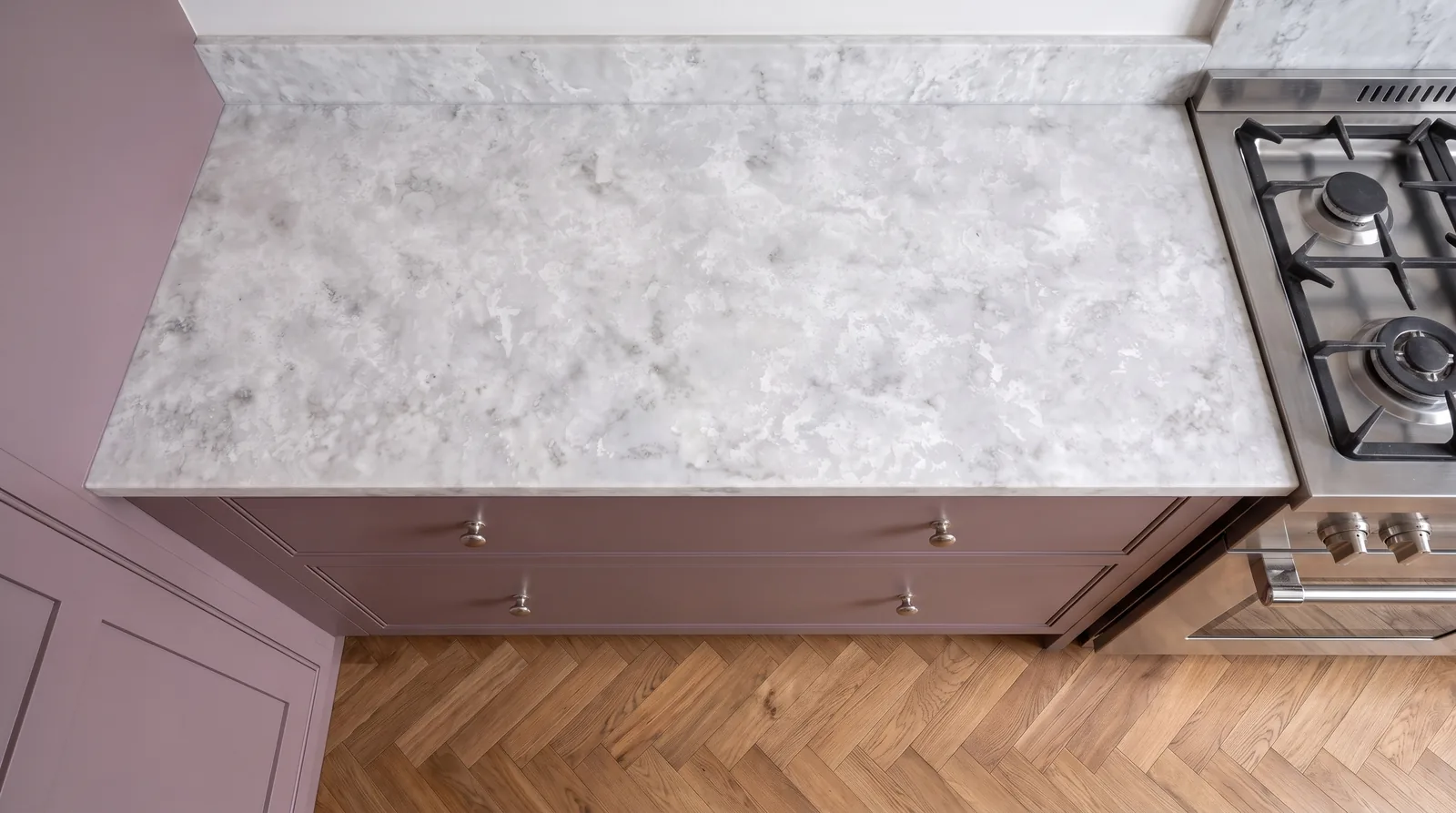 Luna Bianco Polished NobleStone worktop in an overhead kitchen view