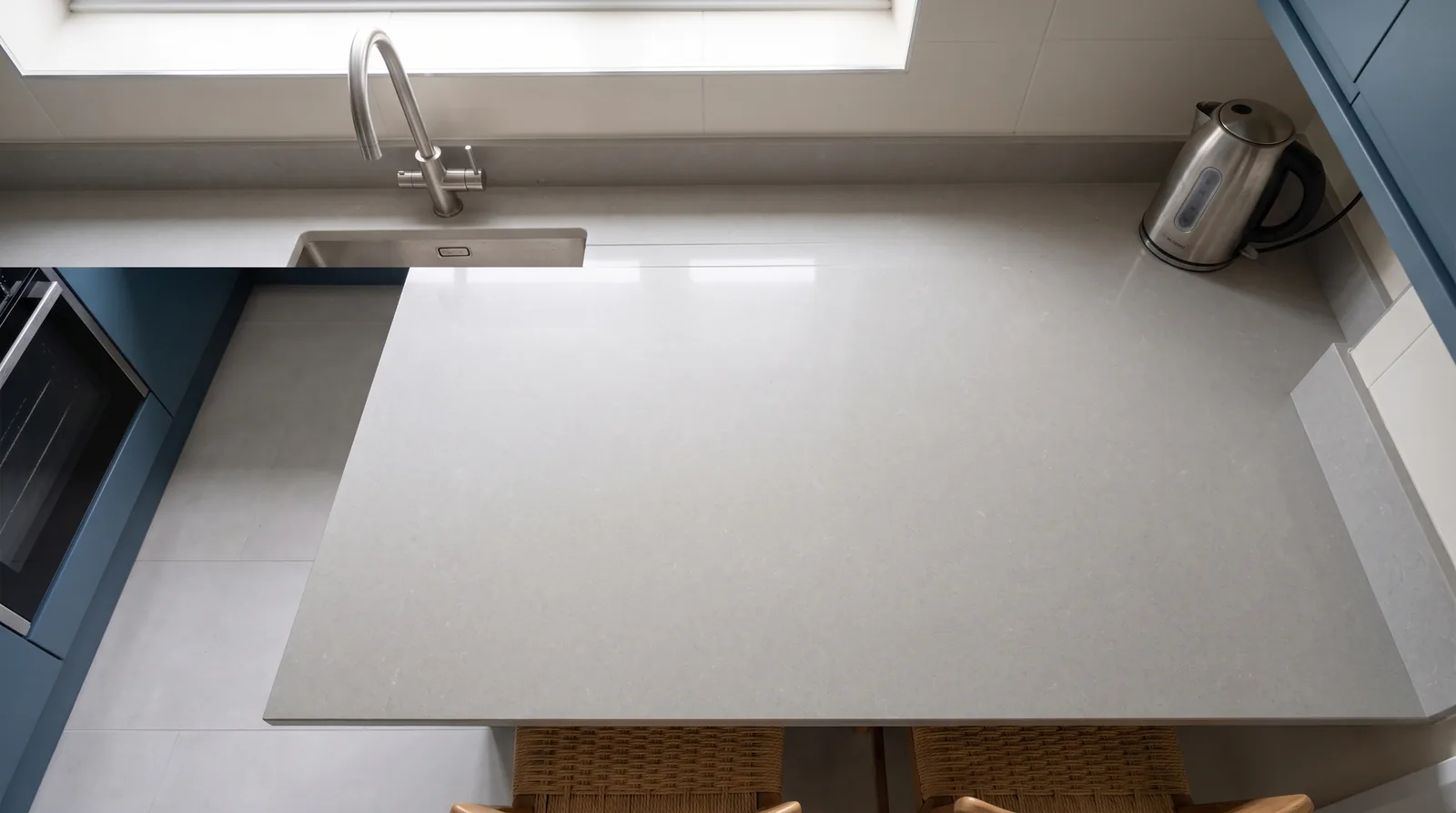 Luna Grey NobleStone worktop in an overhead kitchen view