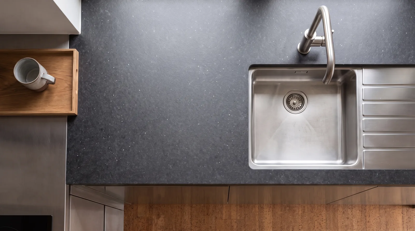Lustre Grey NobleStone worktop in an overhead kitchen view