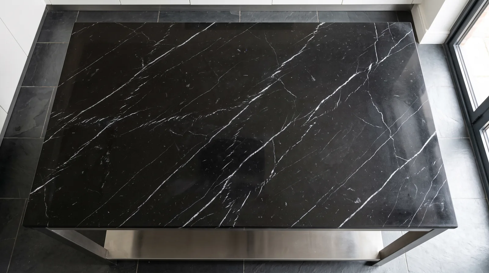 Marquina NobleStone worktop in an overhead kitchen view