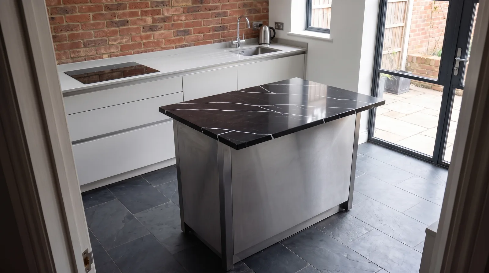 Marquina NobleStone worktop in a wide kitchen view