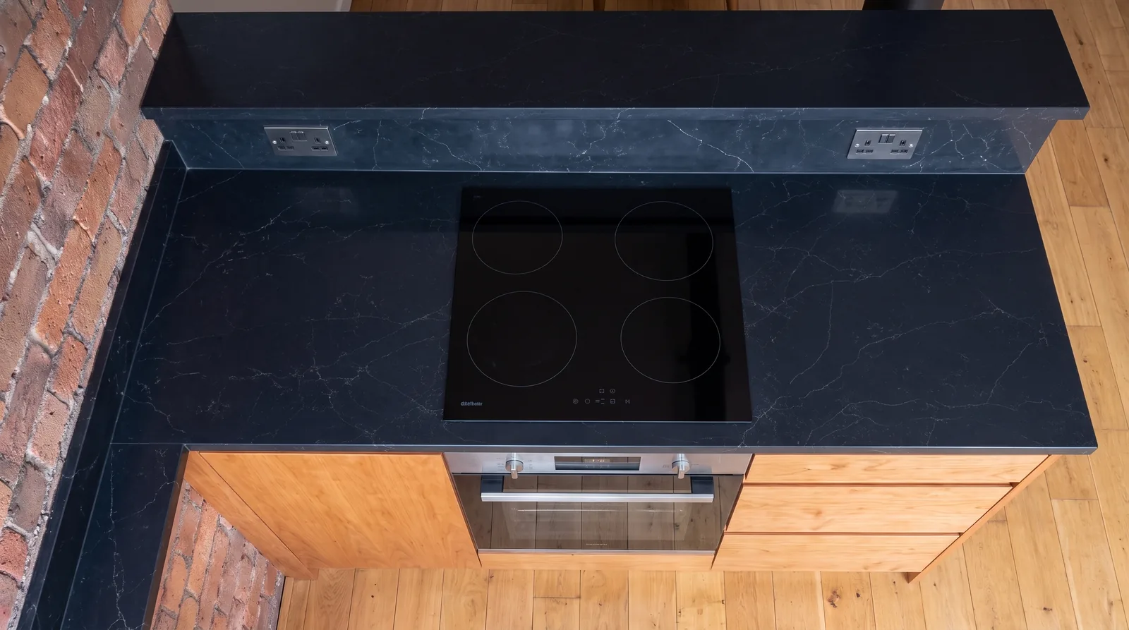 Midnight Vein NobleStone worktop in an overhead kitchen view