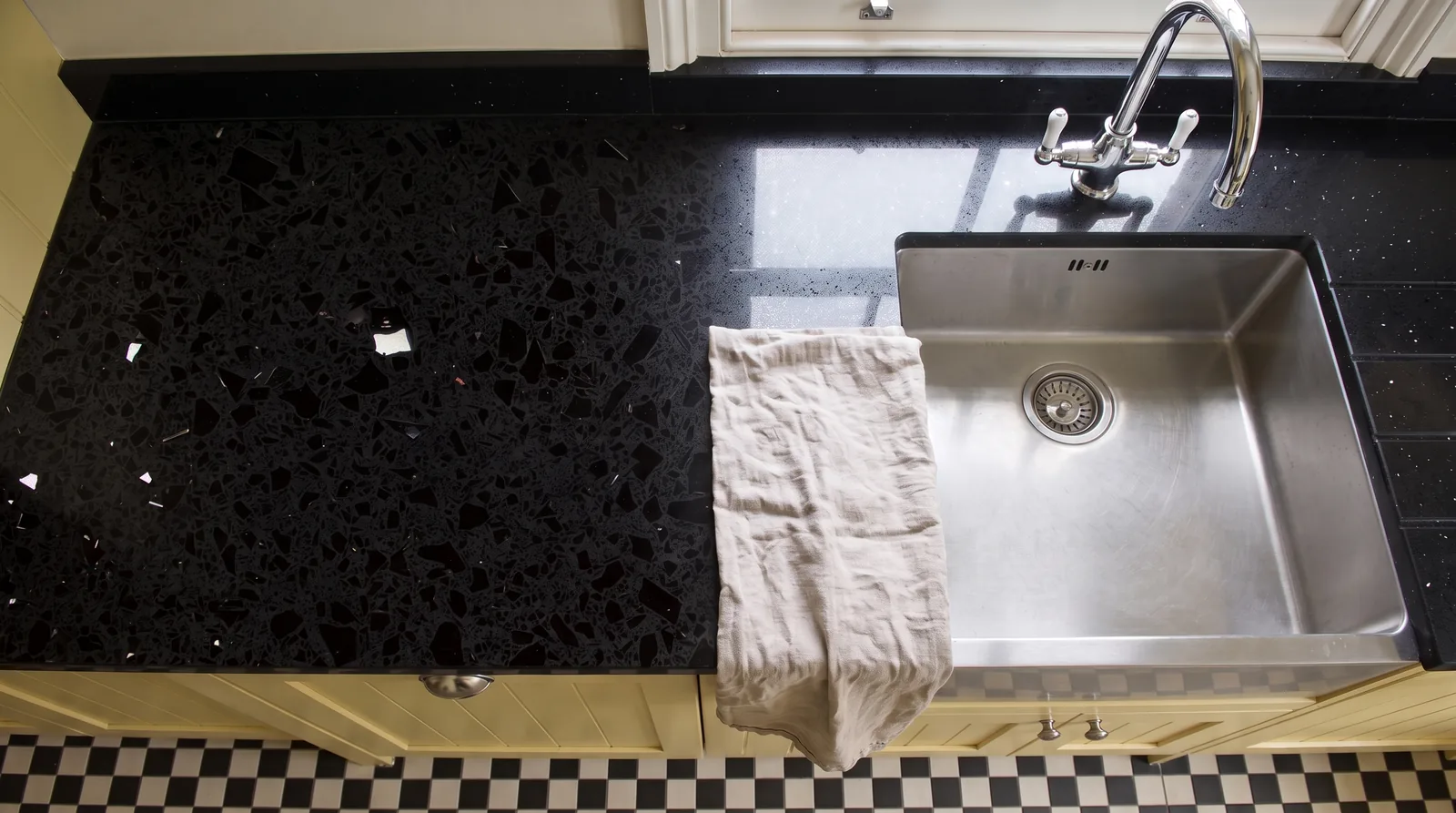Mirror Black NobleStone worktop in an overhead kitchen view