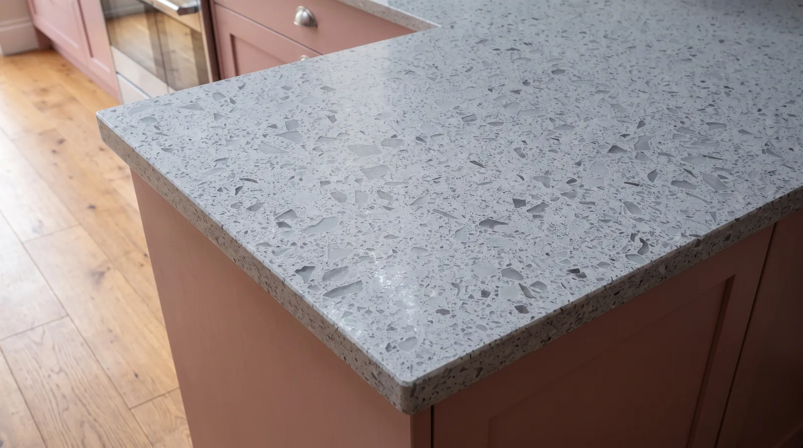 Mirror Light Grey NobleStone worktop in a close kitchen detail view