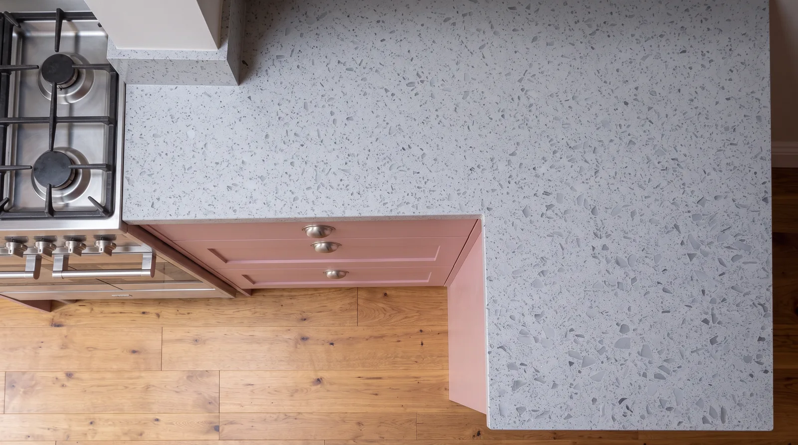 Mirror Light Grey NobleStone worktop in an overhead kitchen view