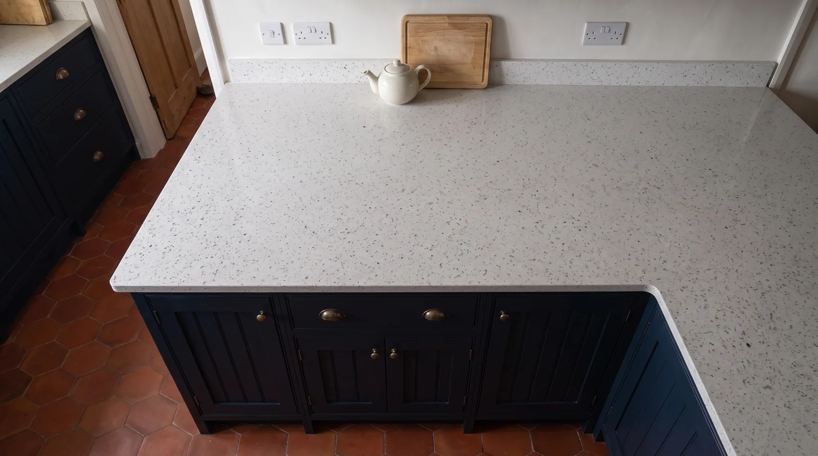 Mirror White NobleStone worktop in an overhead kitchen view