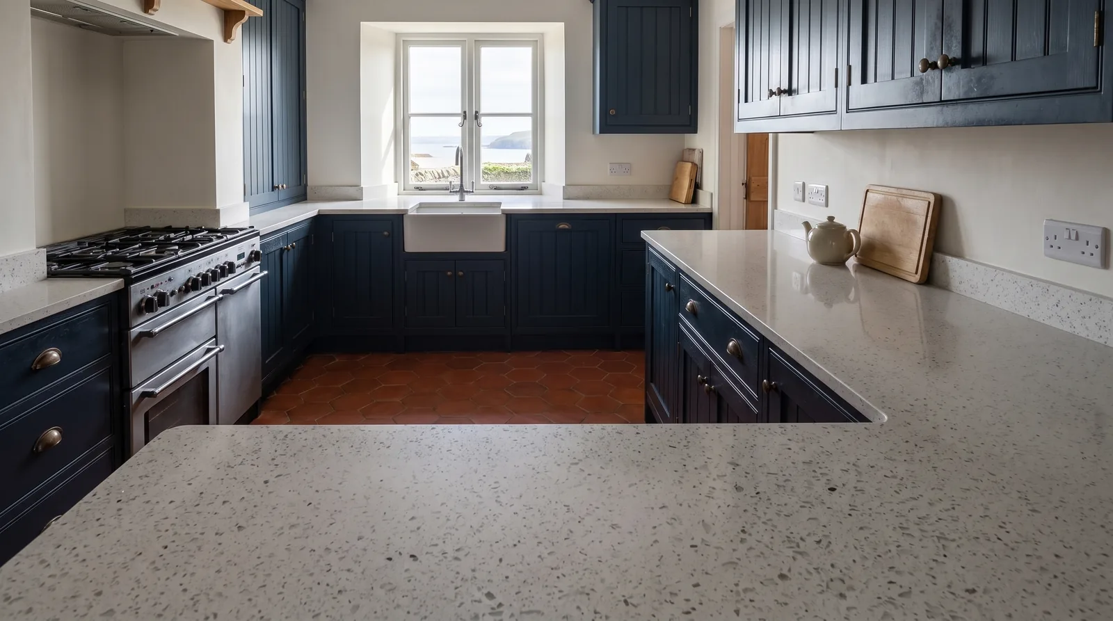 Mirror White NobleStone worktop in a wide kitchen view