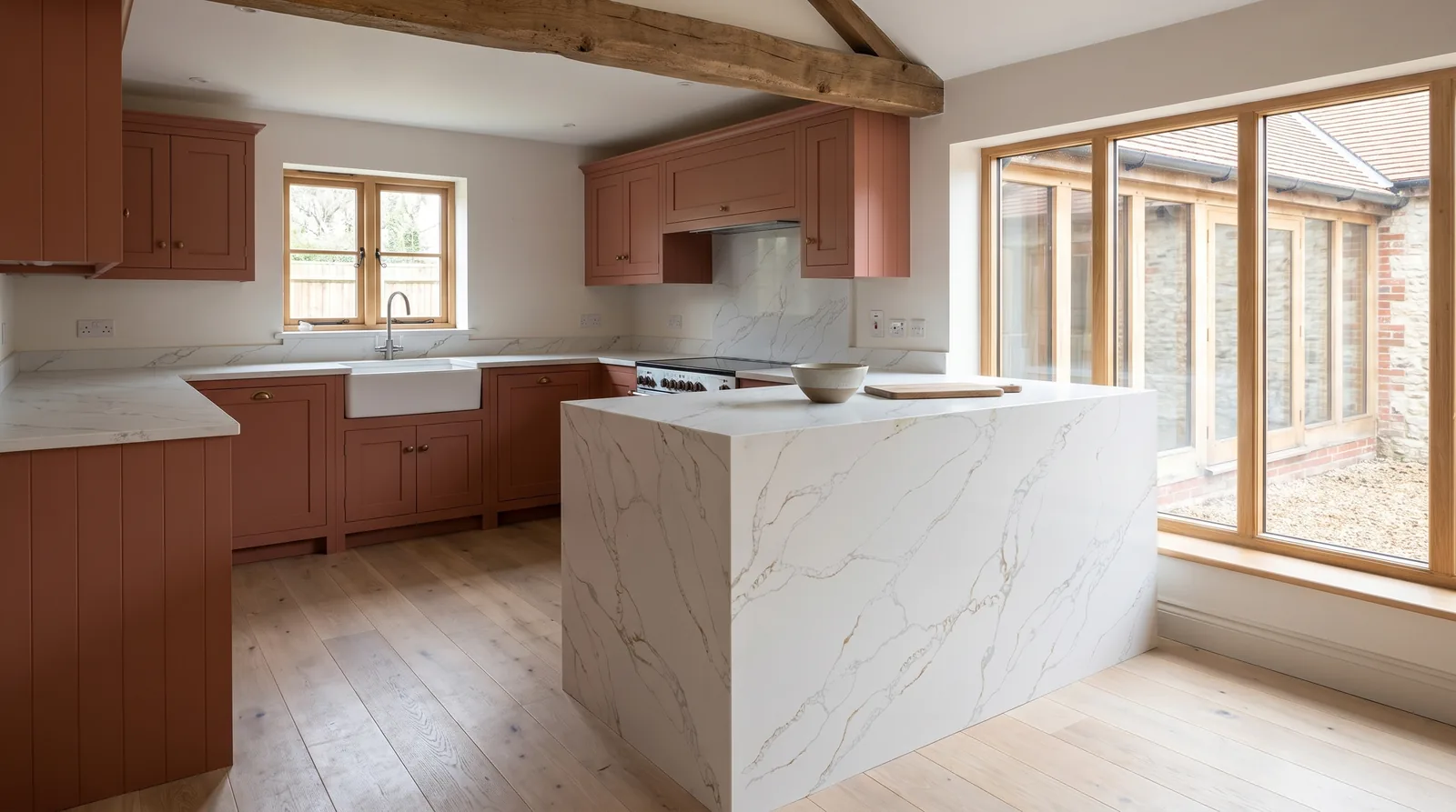 Modena Gold NobleStone worktop in a wide kitchen view