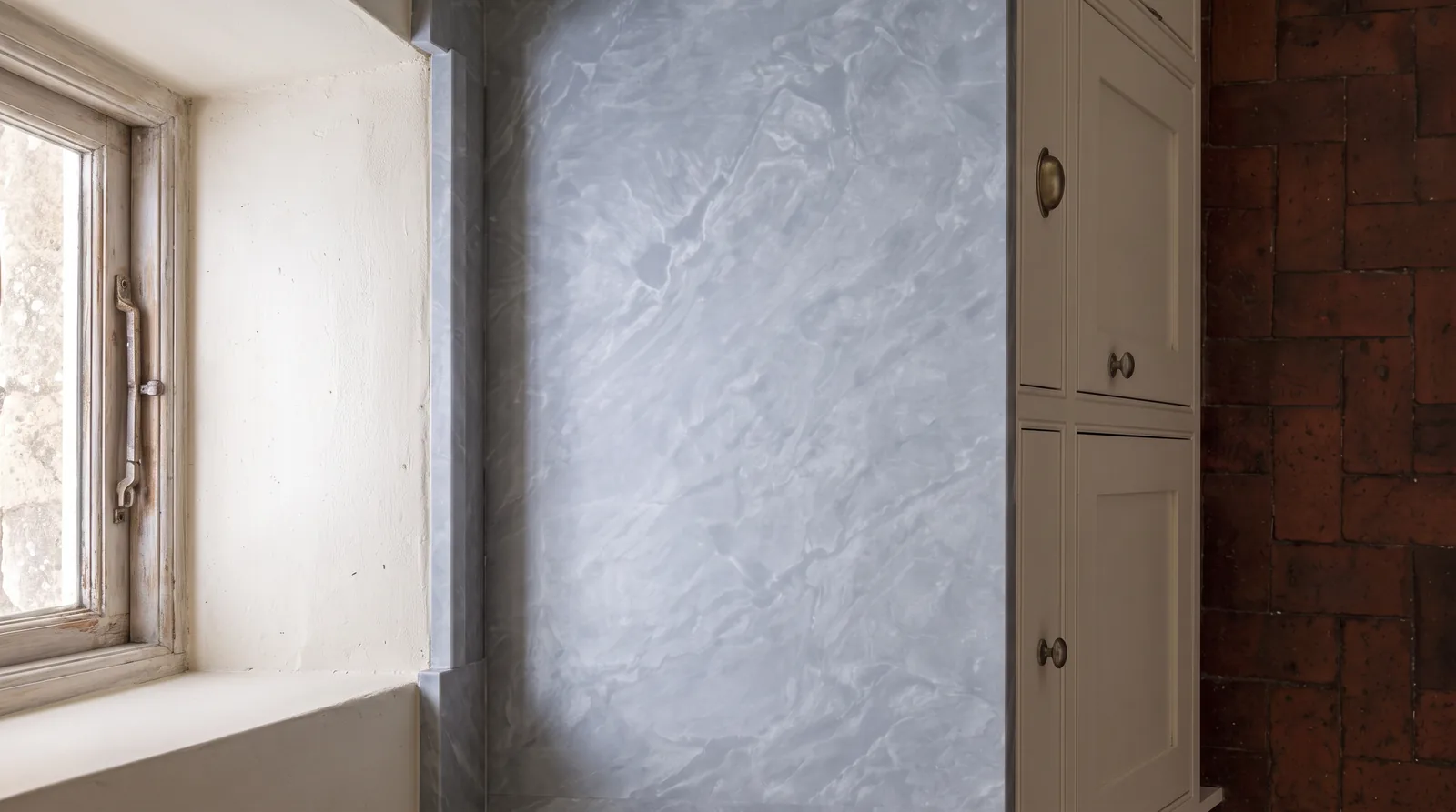 Onyx Ice NobleStone worktop in an overhead kitchen view