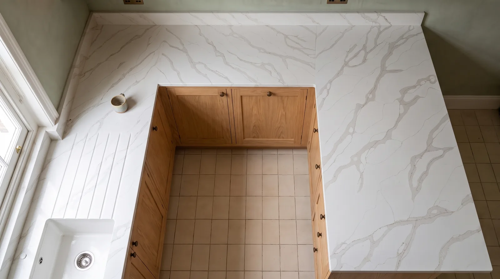 Oro NobleStone worktop in an overhead kitchen view