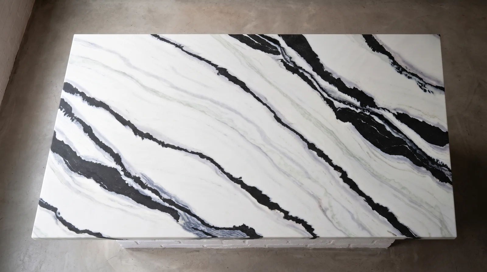 Panda White 3D NobleStone worktop in an overhead kitchen view