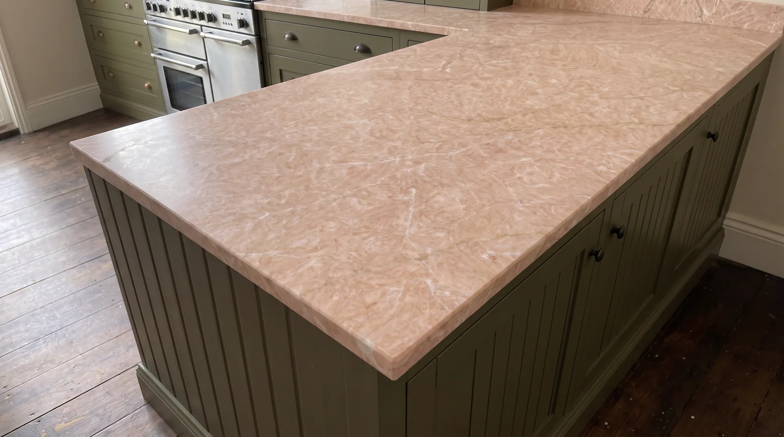 Pink Jade NobleStone worktop in a close kitchen detail view