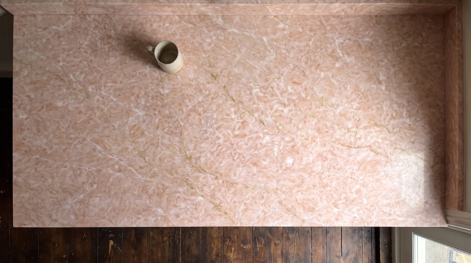 Pink Jade NobleStone worktop in an overhead kitchen view