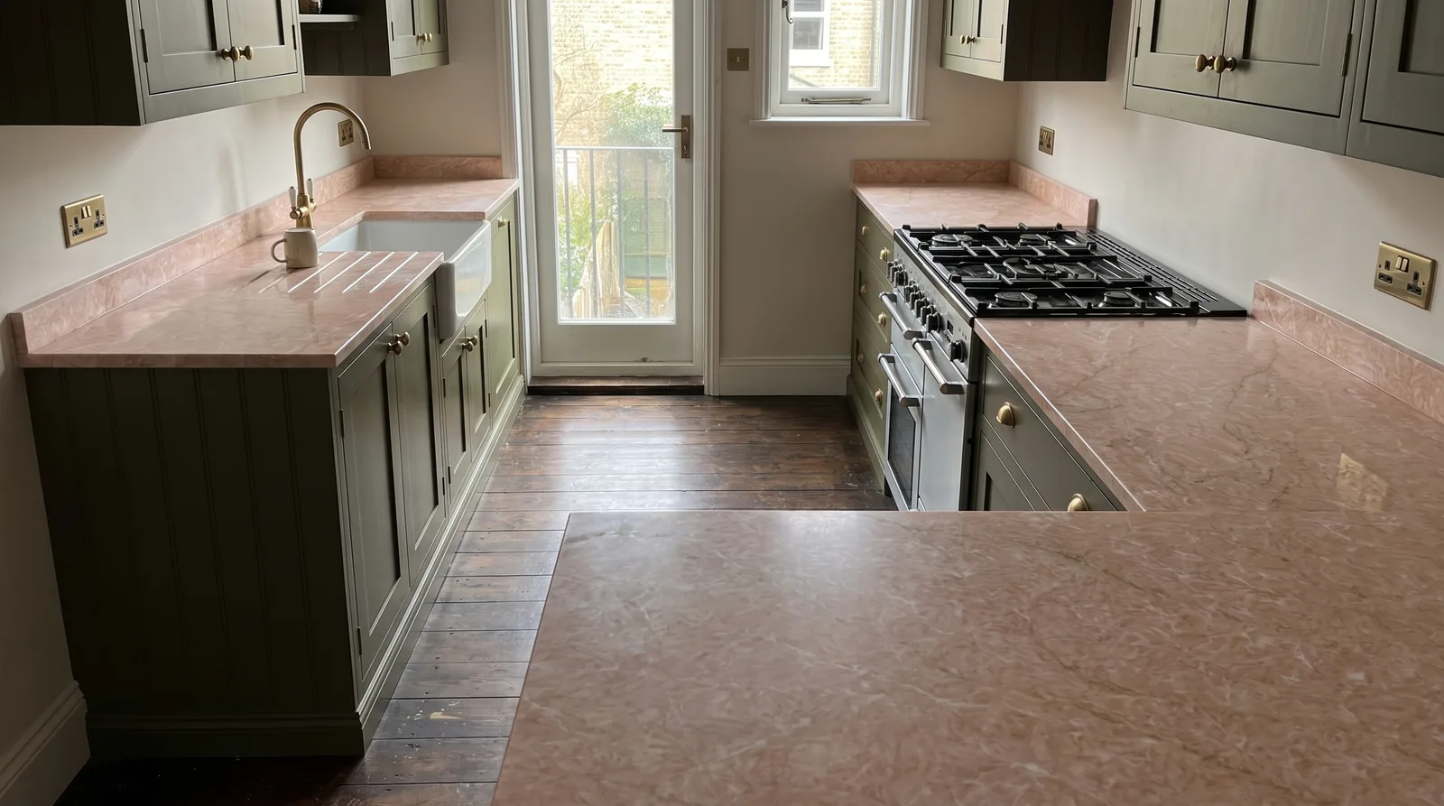 Pink Jade NobleStone worktop in a wide kitchen view