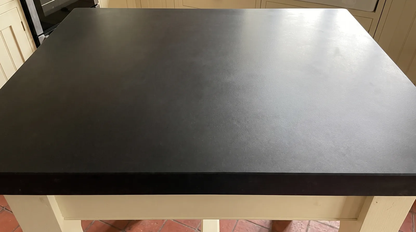 Pure Black NobleStone worktop in a close kitchen detail view