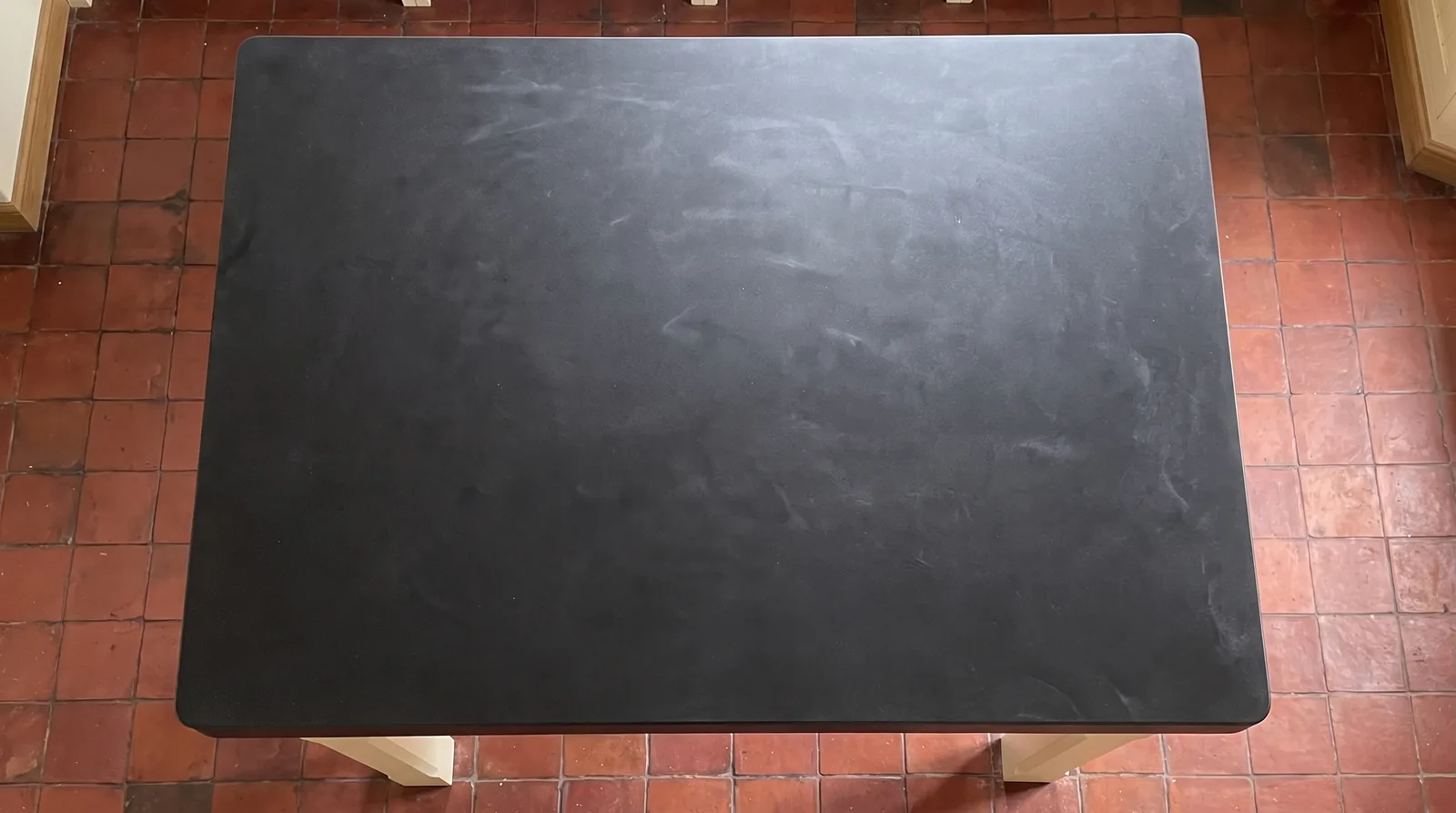 Pure Black NobleStone worktop in an overhead kitchen view