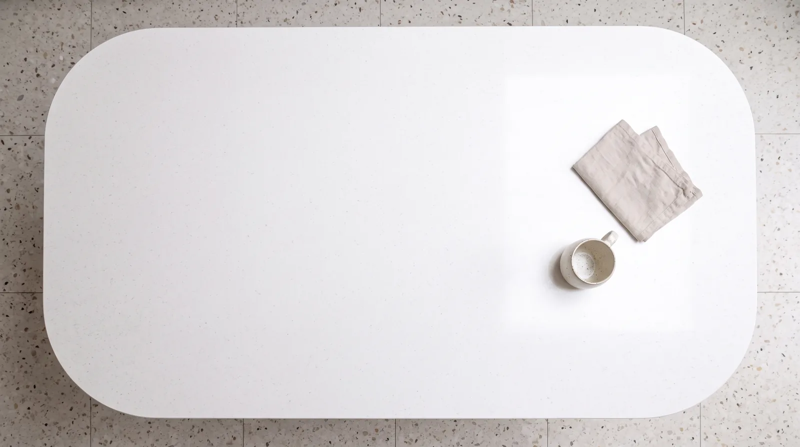 Pure White NobleStone worktop in an overhead kitchen view