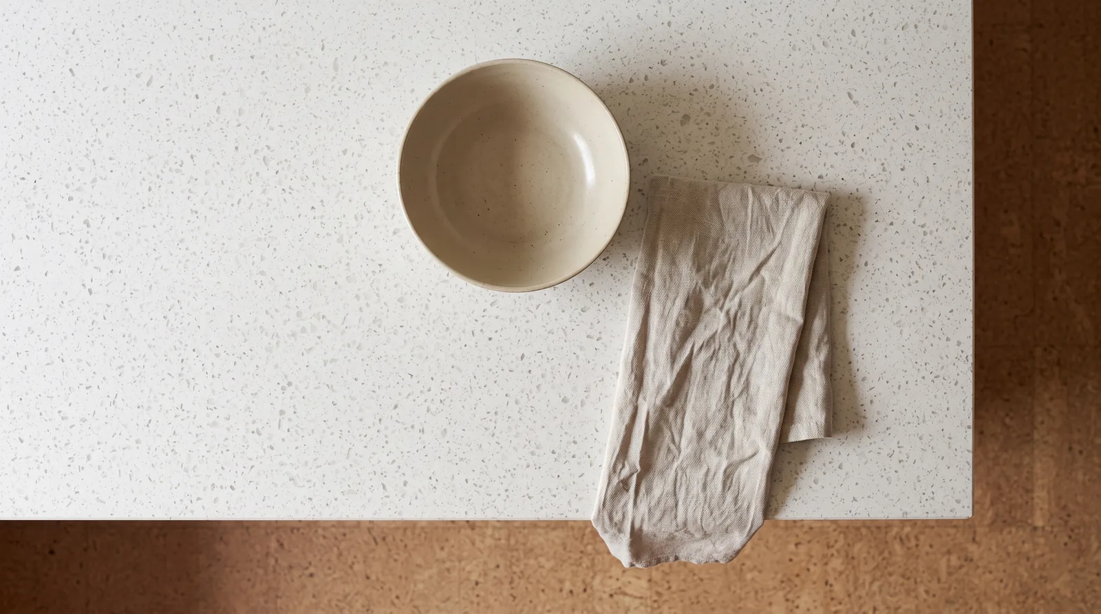 Salt & Pepper NobleStone worktop in an overhead kitchen view