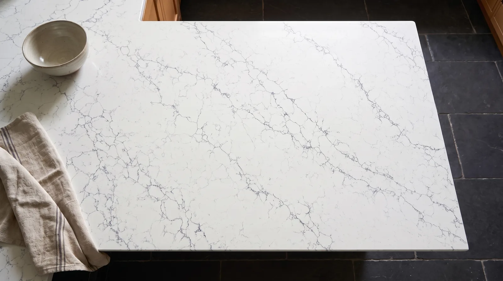 Silk White NobleStone worktop in an overhead kitchen view