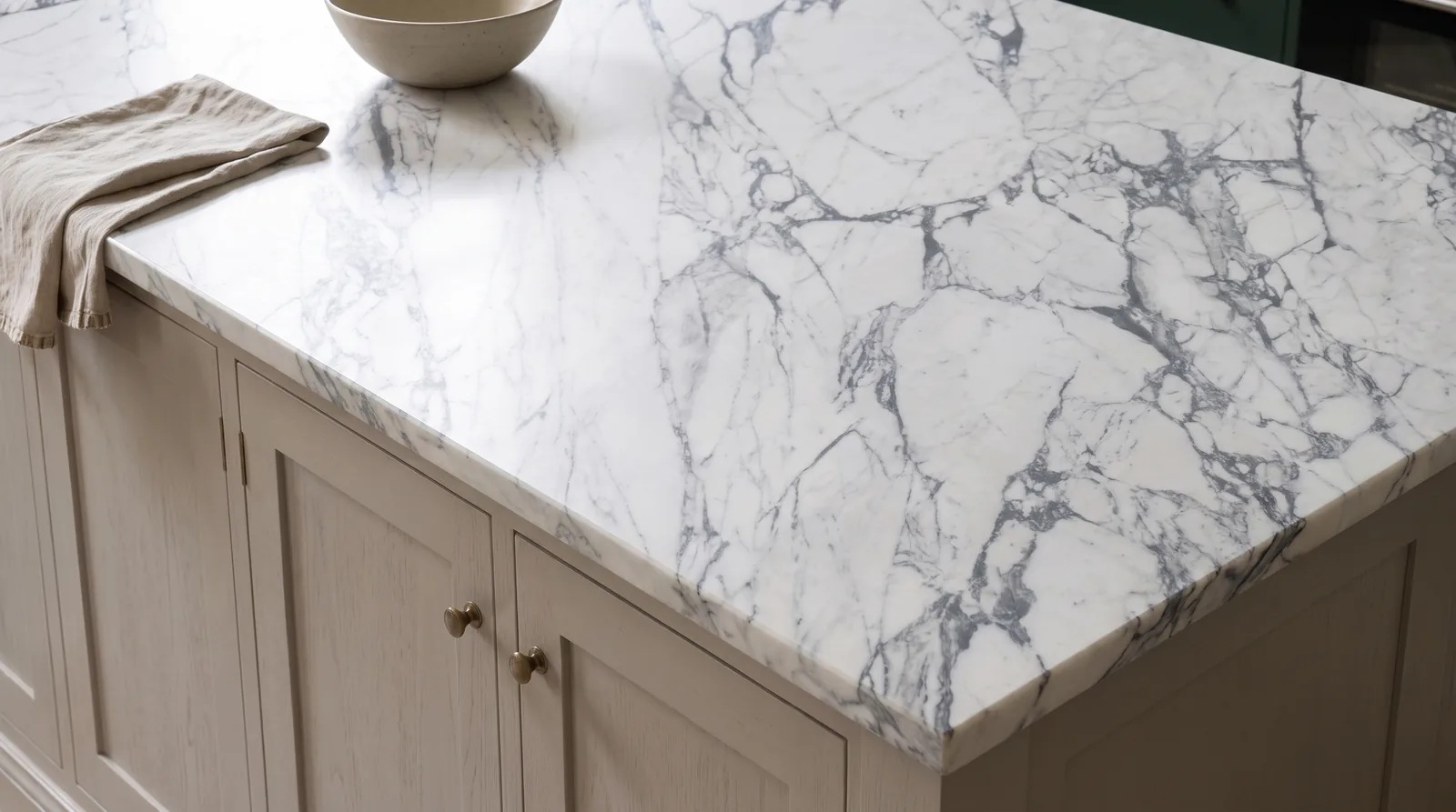 Statuario Extra 3D NobleStone worktop in a close kitchen detail view