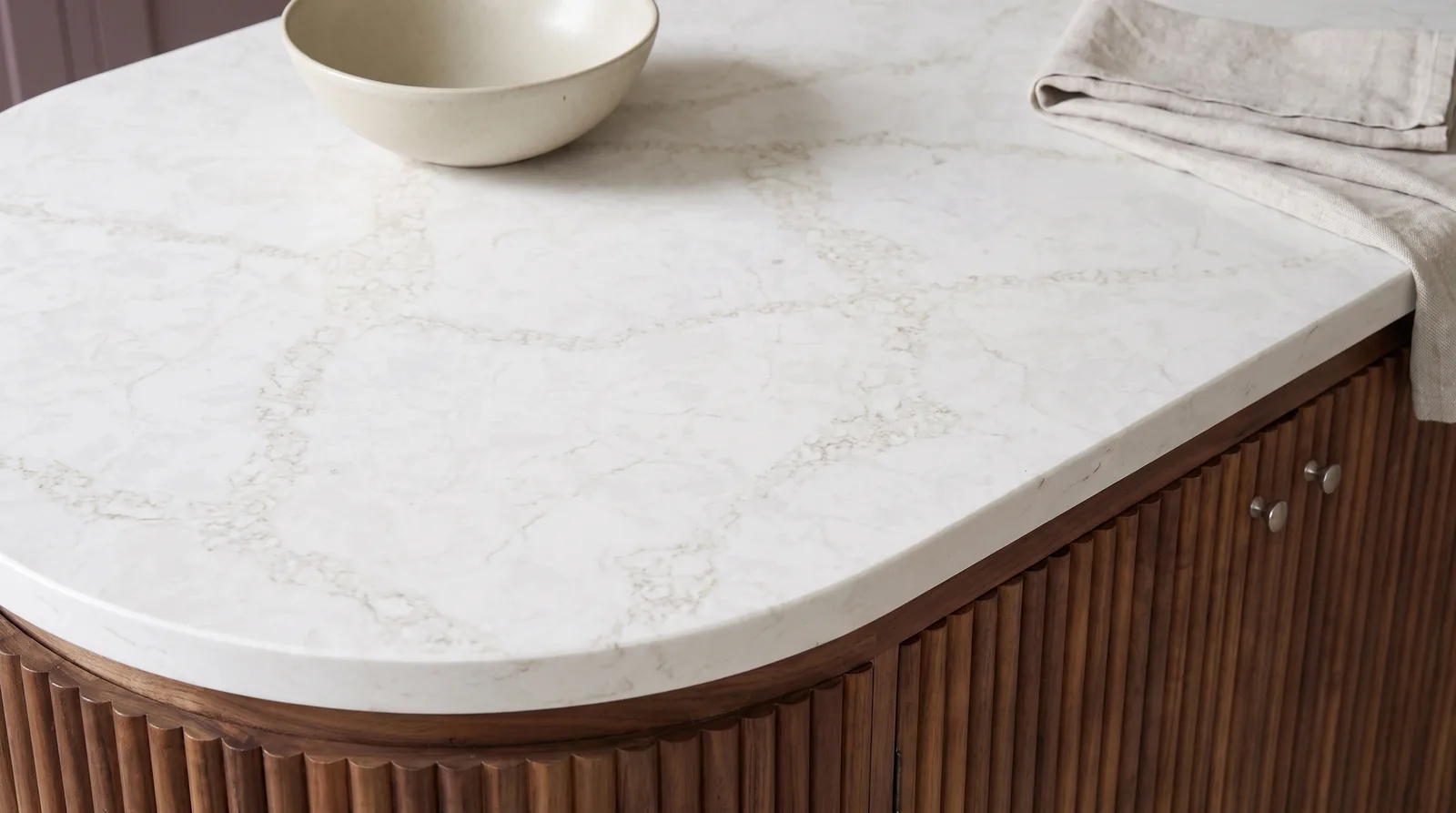Statuario Gold NobleStone worktop in a close kitchen detail view