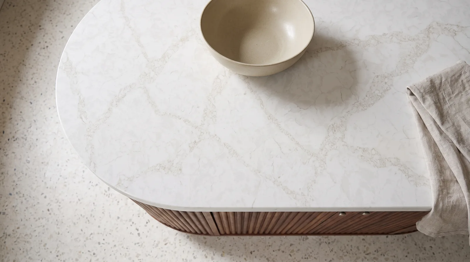 Statuario Gold NobleStone worktop in an overhead kitchen view