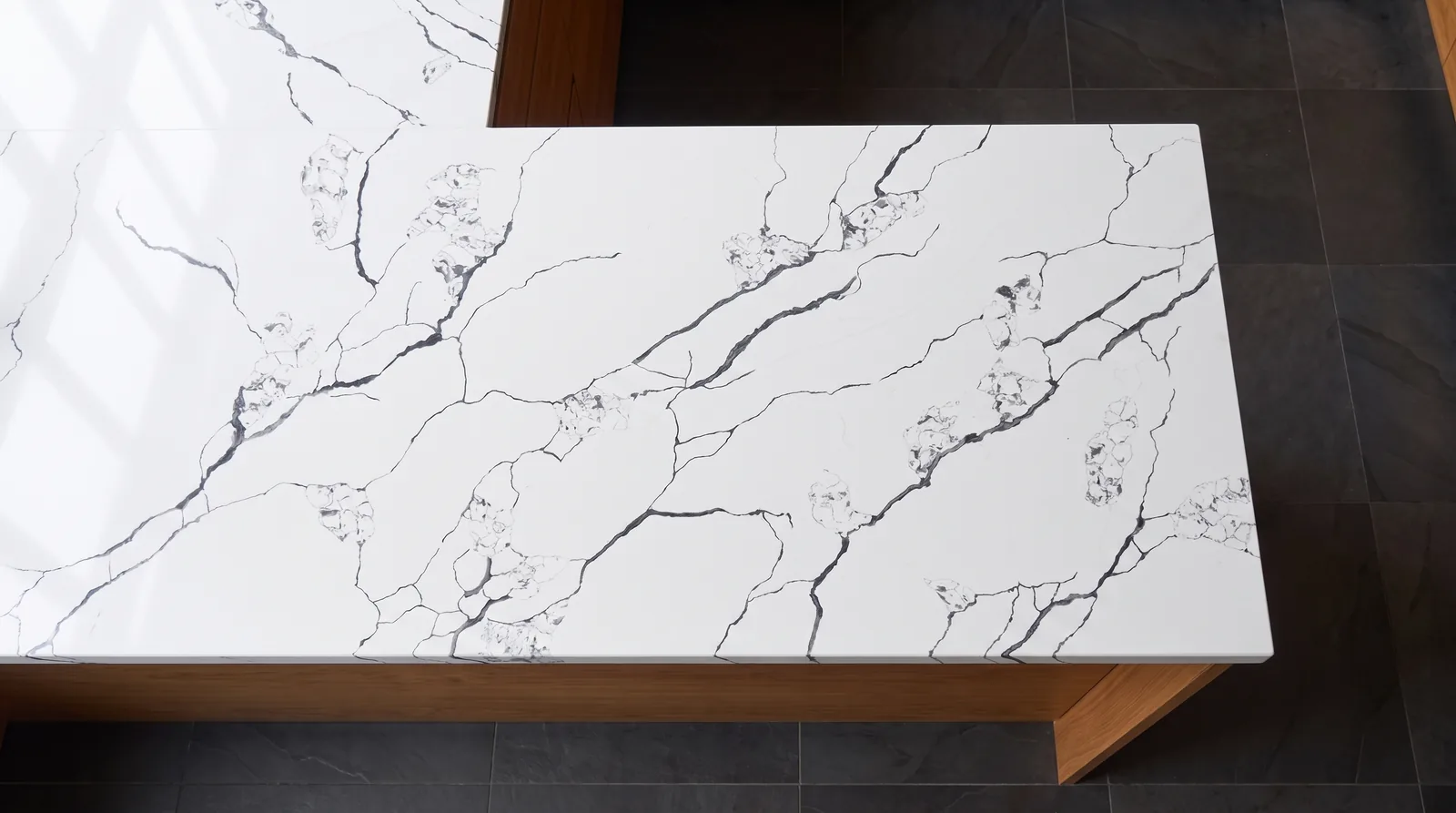 Sydney Black NobleStone worktop in an overhead kitchen view
