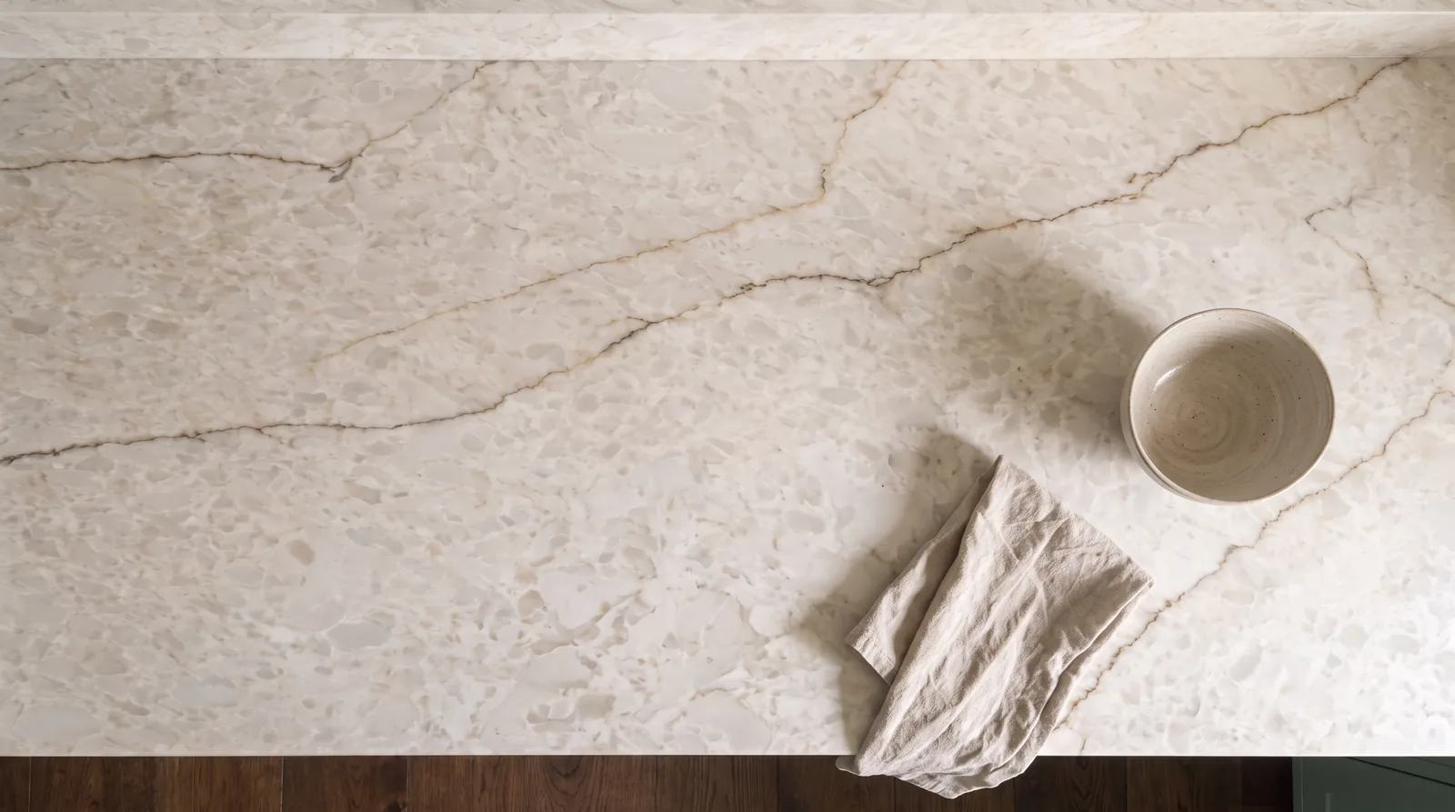 Taj Ivory NobleStone worktop in an overhead kitchen view
