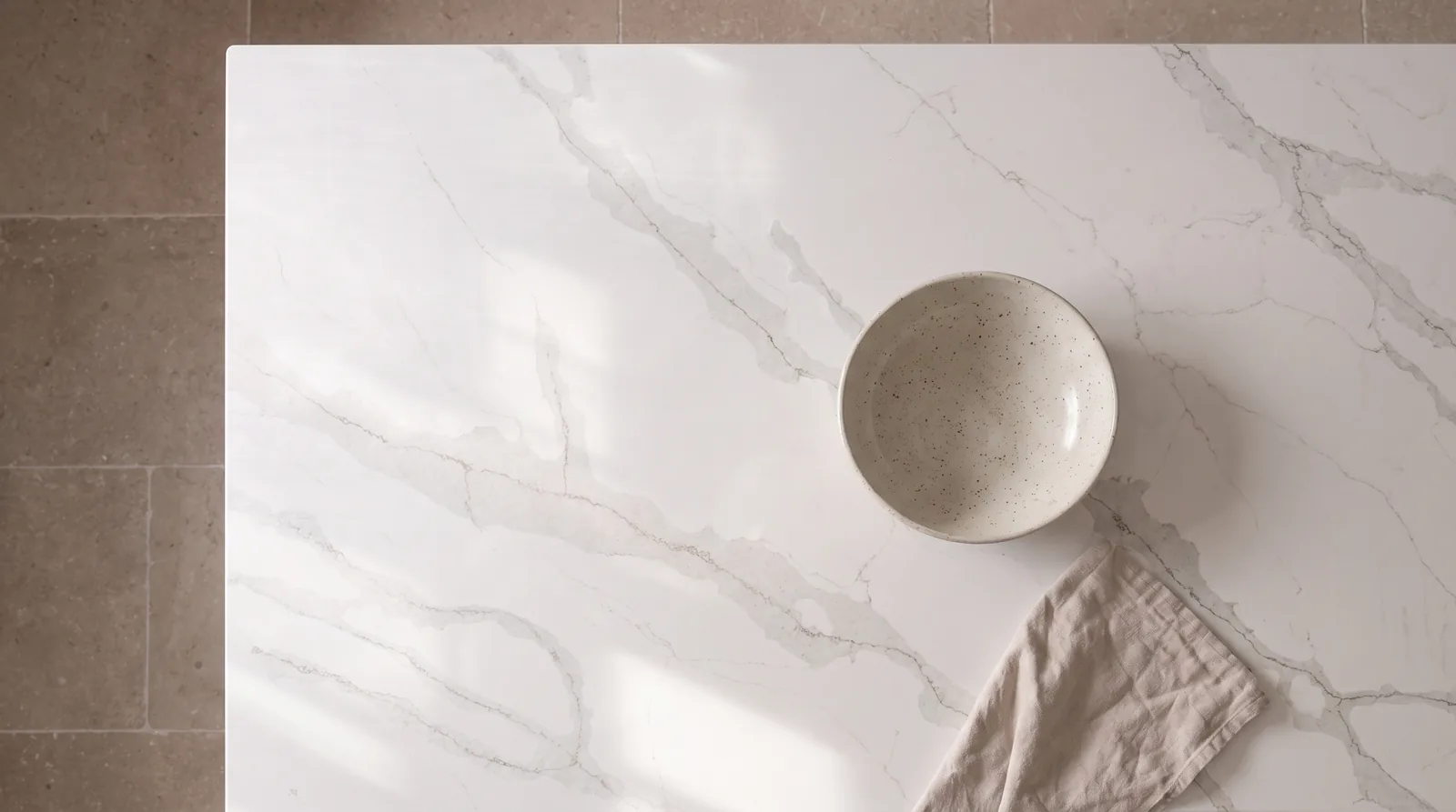Tala (Gold) Shimmer NobleStone worktop in an overhead kitchen view