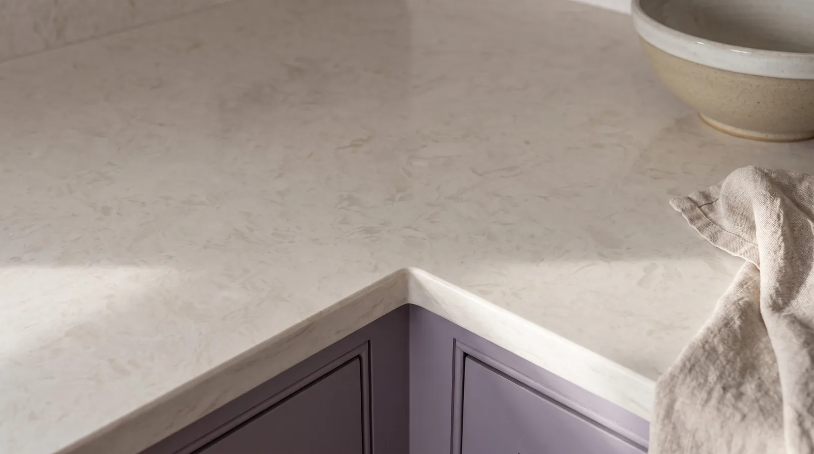 Vanilla NobleStone worktop in a close kitchen detail view