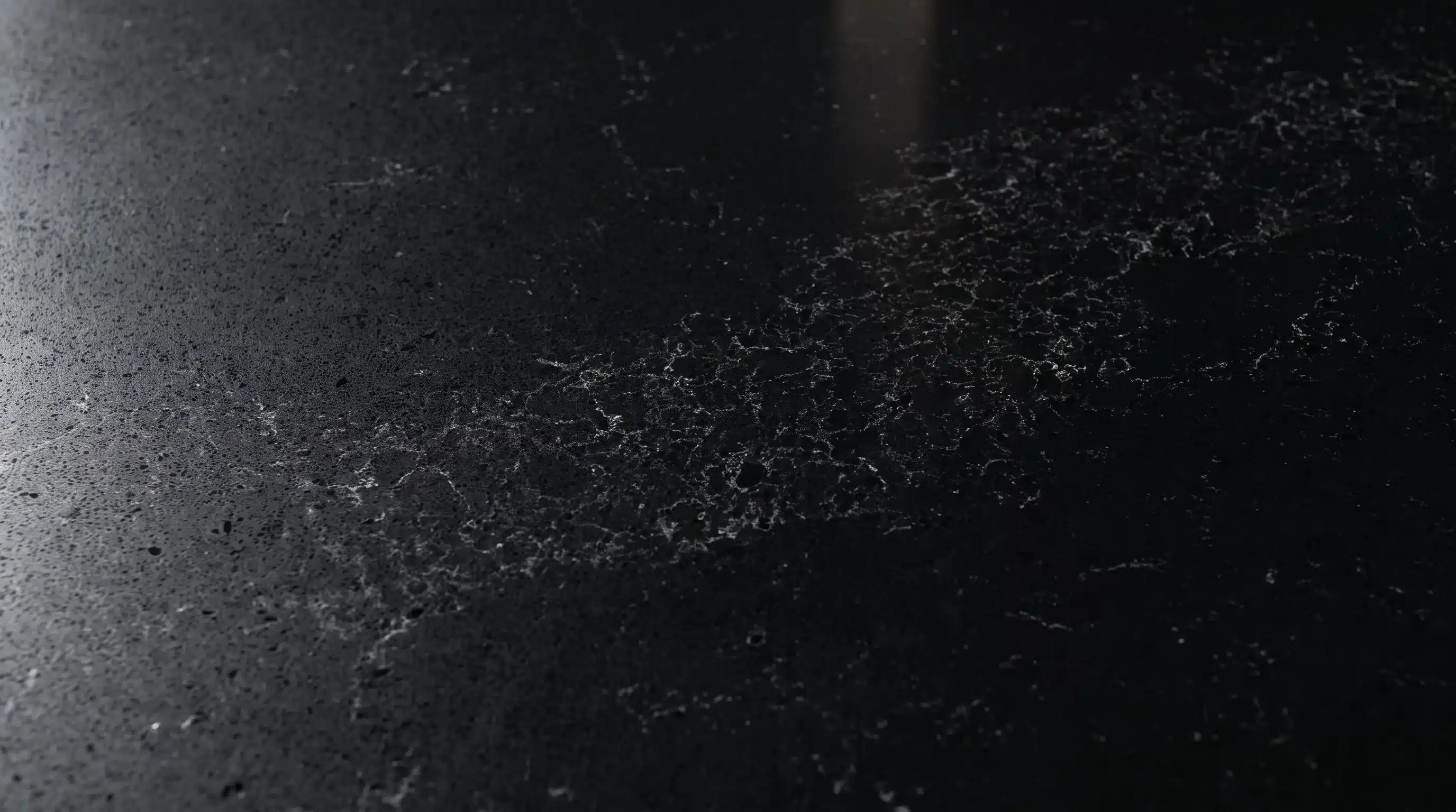 Close-up of Valiente Black CQ7713 quartz worktop surface detail