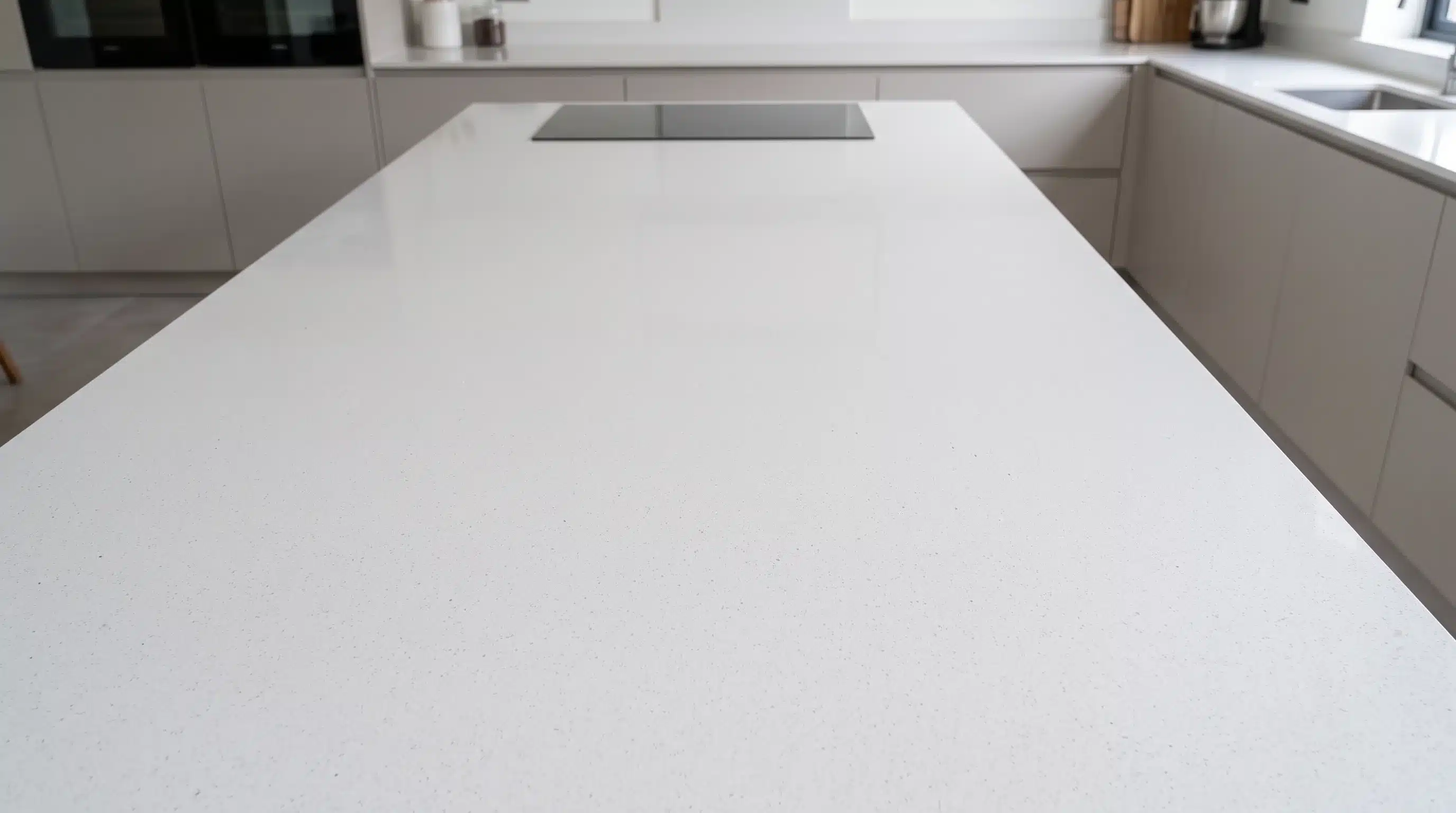 Overhead view of Ice Branco CQC120 quartz worktop in a fitted kitchen